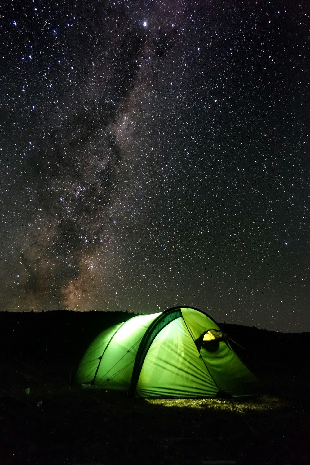 green tent under starry night