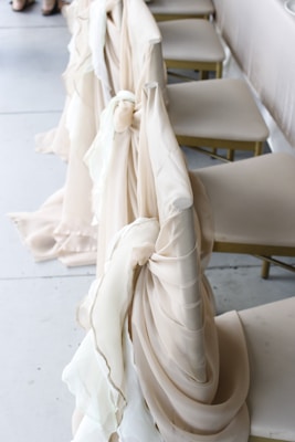 A variety of chair covers displayed on different chair styles showing versatility and fit.