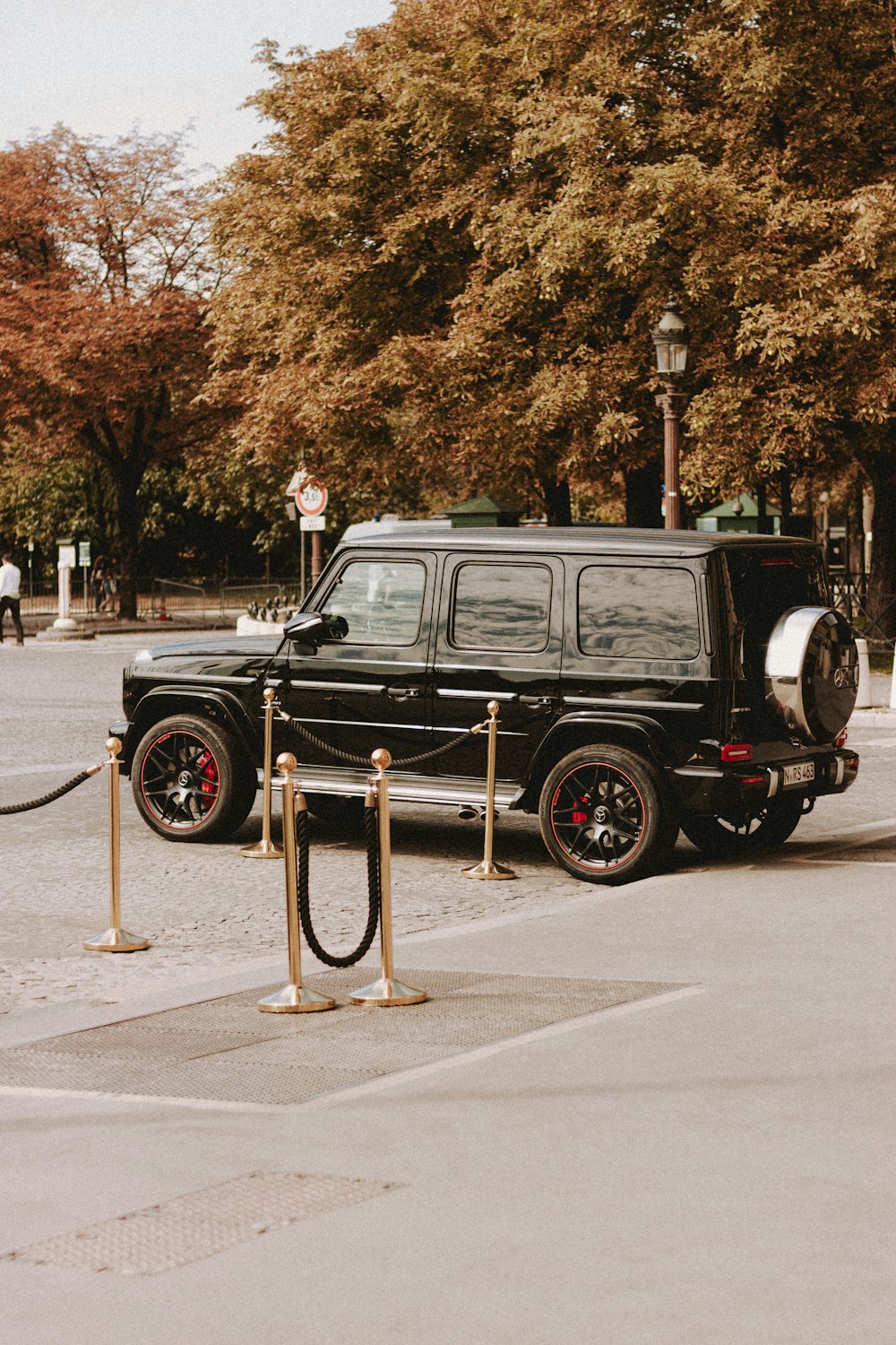 black suv on road during daytime