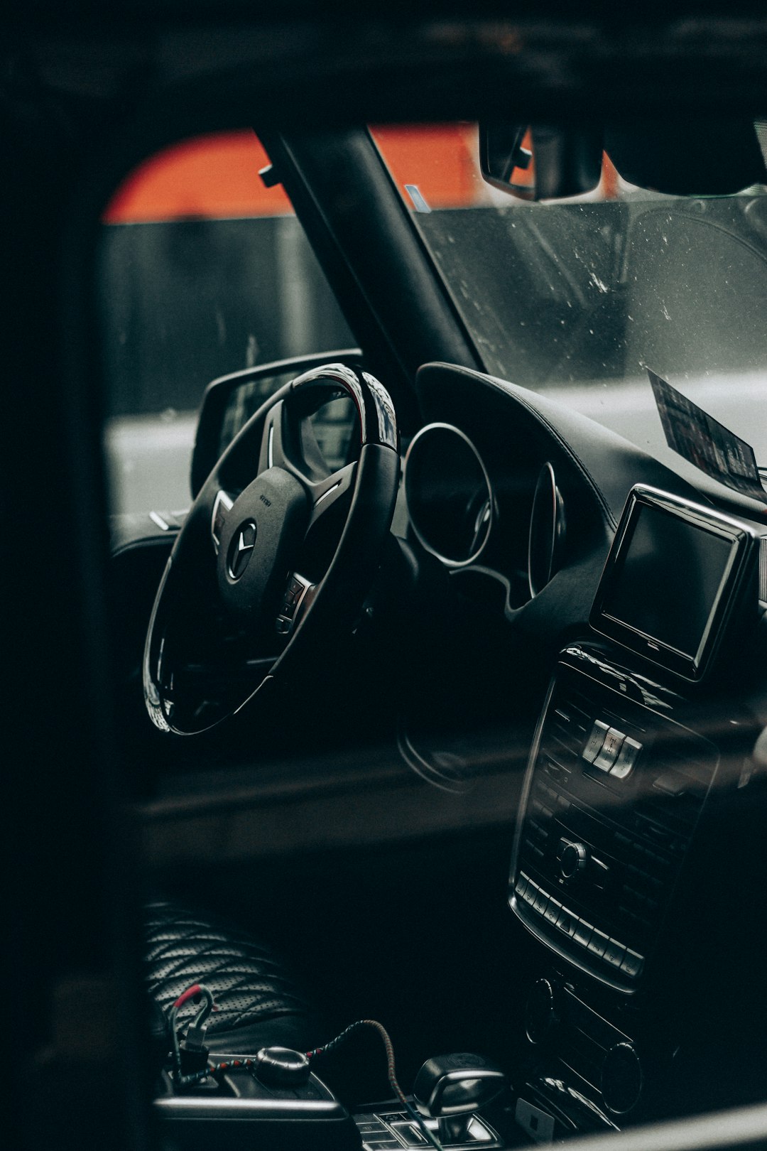 black car with black steering wheel