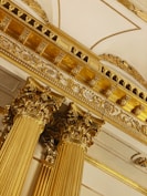 gold and white concrete building