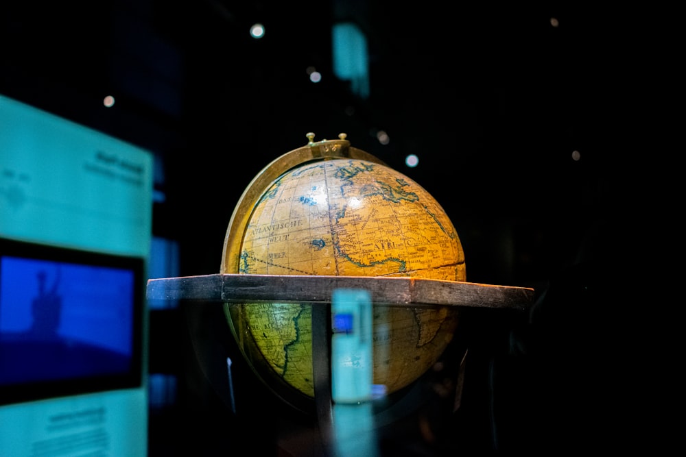 brown wooden globe with light