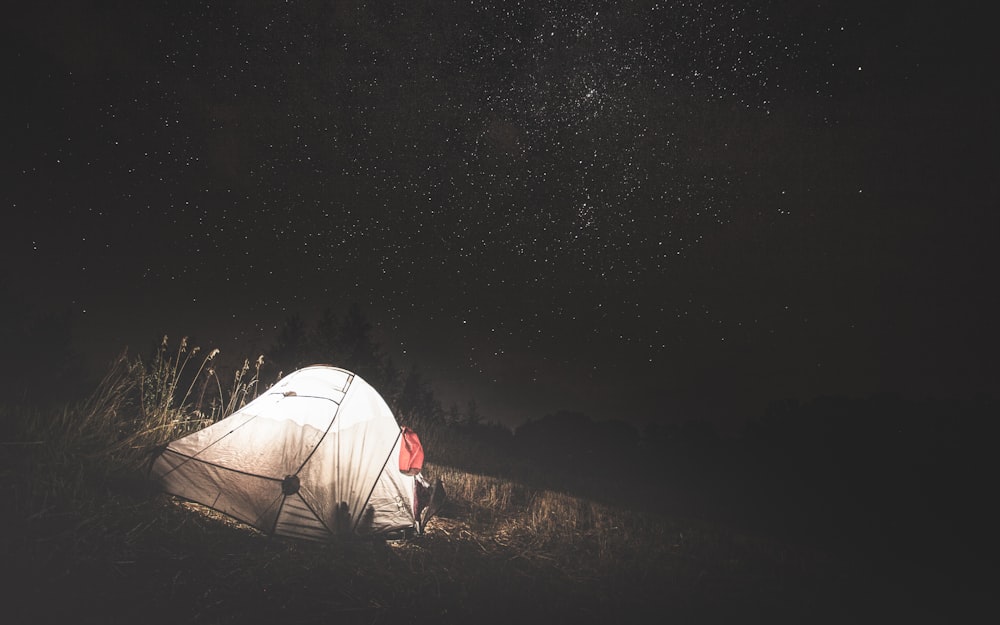 white tent under starry night