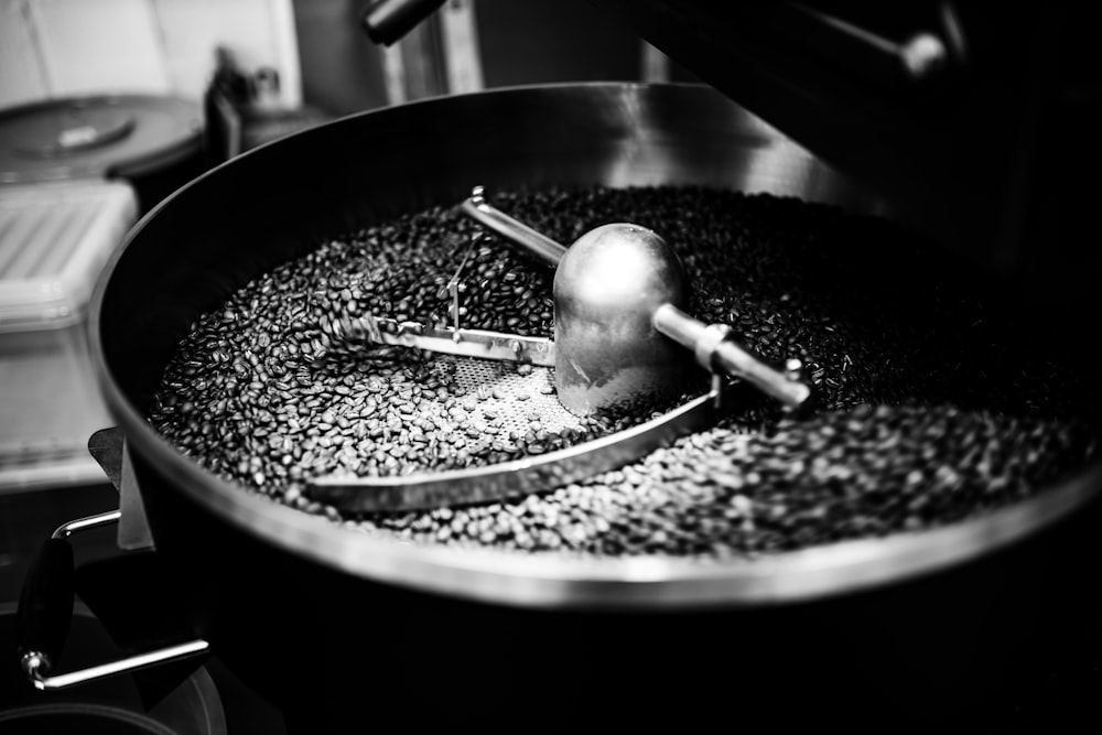 stainless steel spoon on black round plate