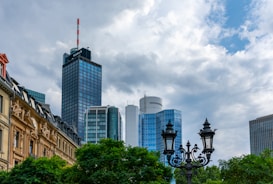 Close-up of an energy certificate document with a Lübeck cityscape in the background.