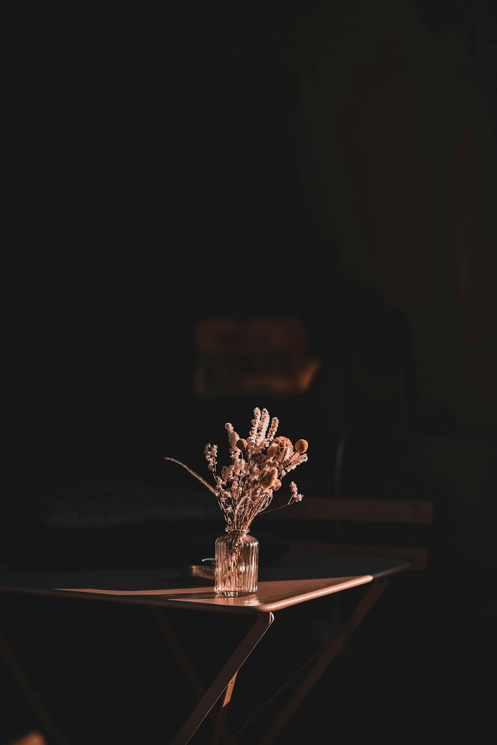 gold deer figurine on brown wooden table