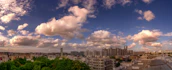 A panoramic cityscape showcasing residential and commercial properties available through Global Path.