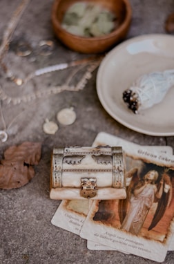 silver ring on brown wooden box