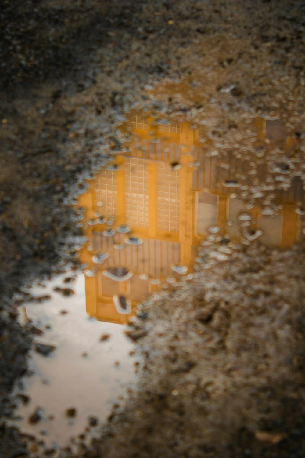 yellow plastic building blocks on snow covered ground