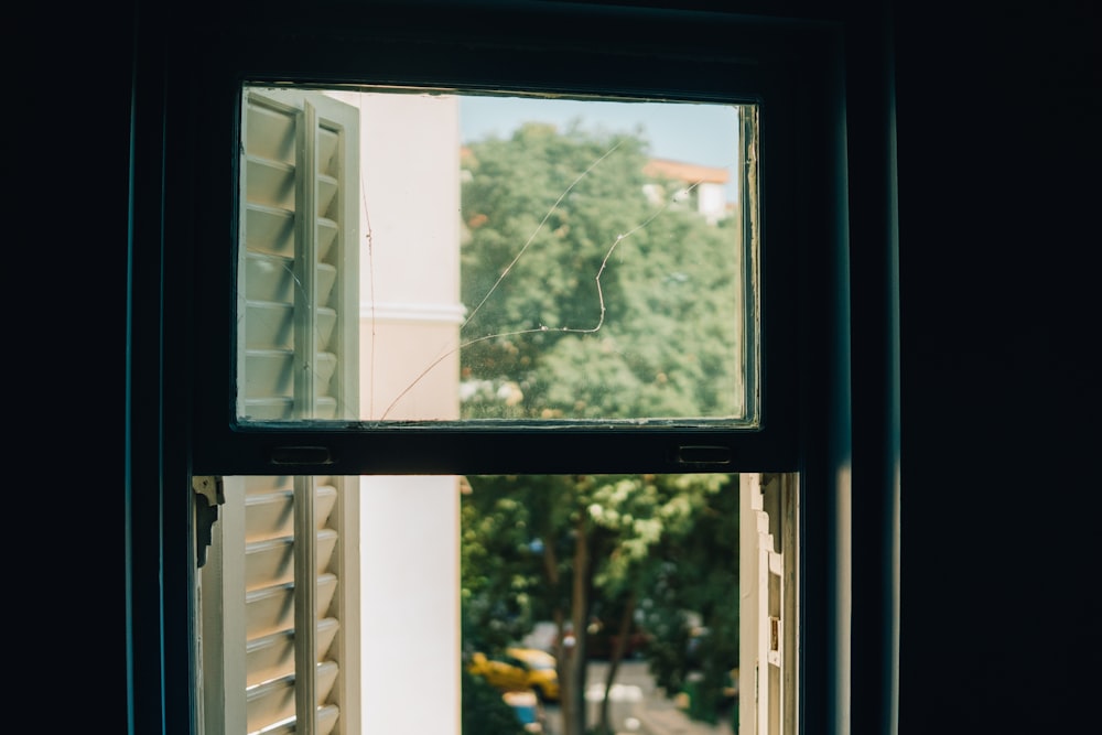 white wooden framed glass window