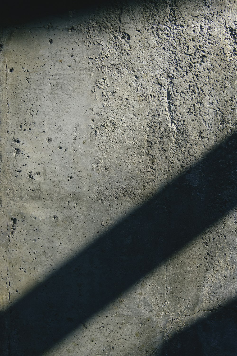 black metal bar on gray concrete floor