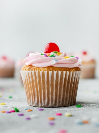 cupcake with pink icing on top