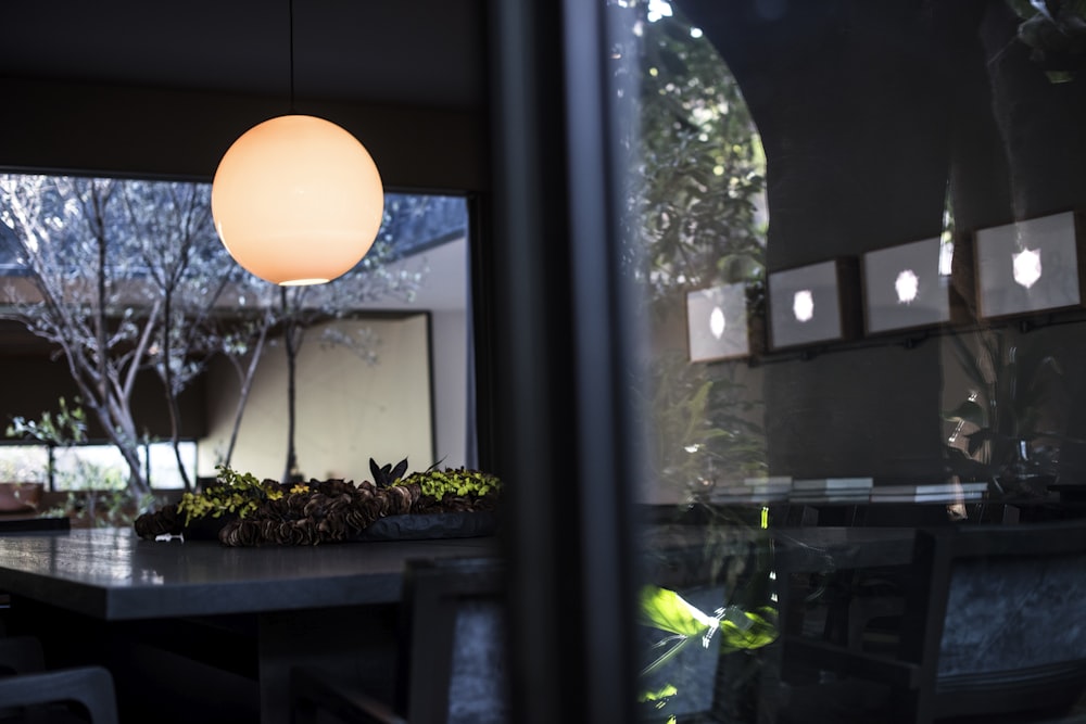 white round ball on window