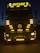 A large truck with multiple bright yellow lights around its front. The word 'ROTASIZ' is illuminated on top of the truck. Some details and symbols, including a central emblem, are visible on the grill and bumper. The vehicle is stationary against a dark background, giving a sense of night or low-light conditions.