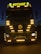 A large truck with multiple bright yellow lights around its front. The word 'ROTASIZ' is illuminated on top of the truck. Some details and symbols, including a central emblem, are visible on the grill and bumper. The vehicle is stationary against a dark background, giving a sense of night or low-light conditions.