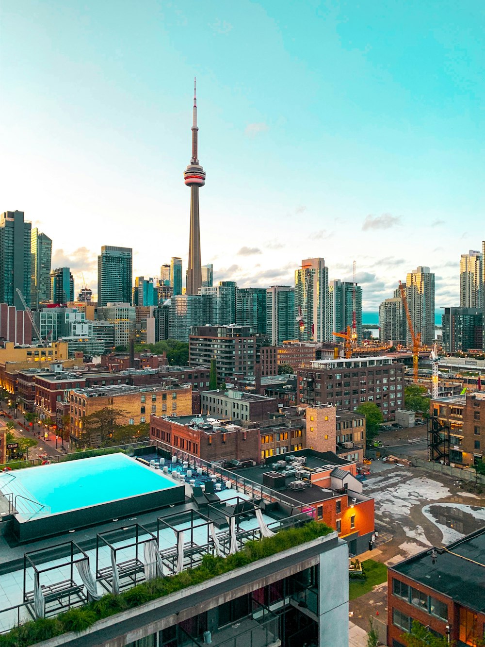 city skyline under blue sky during daytime