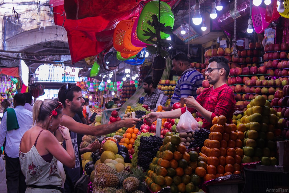 people in market during daytime