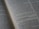 A close-up view of an open book displaying text in English, likely from a religious or historical context. The text appears to be formatted in paragraphs with some sections in bold, possibly indicating headings or significant passages.