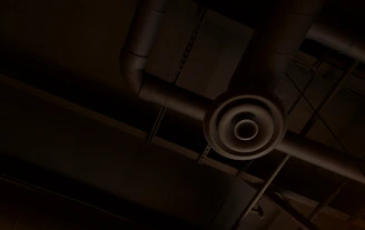 Technical illustration of HVAC ducts, plumbing pipes, and electrical wiring.