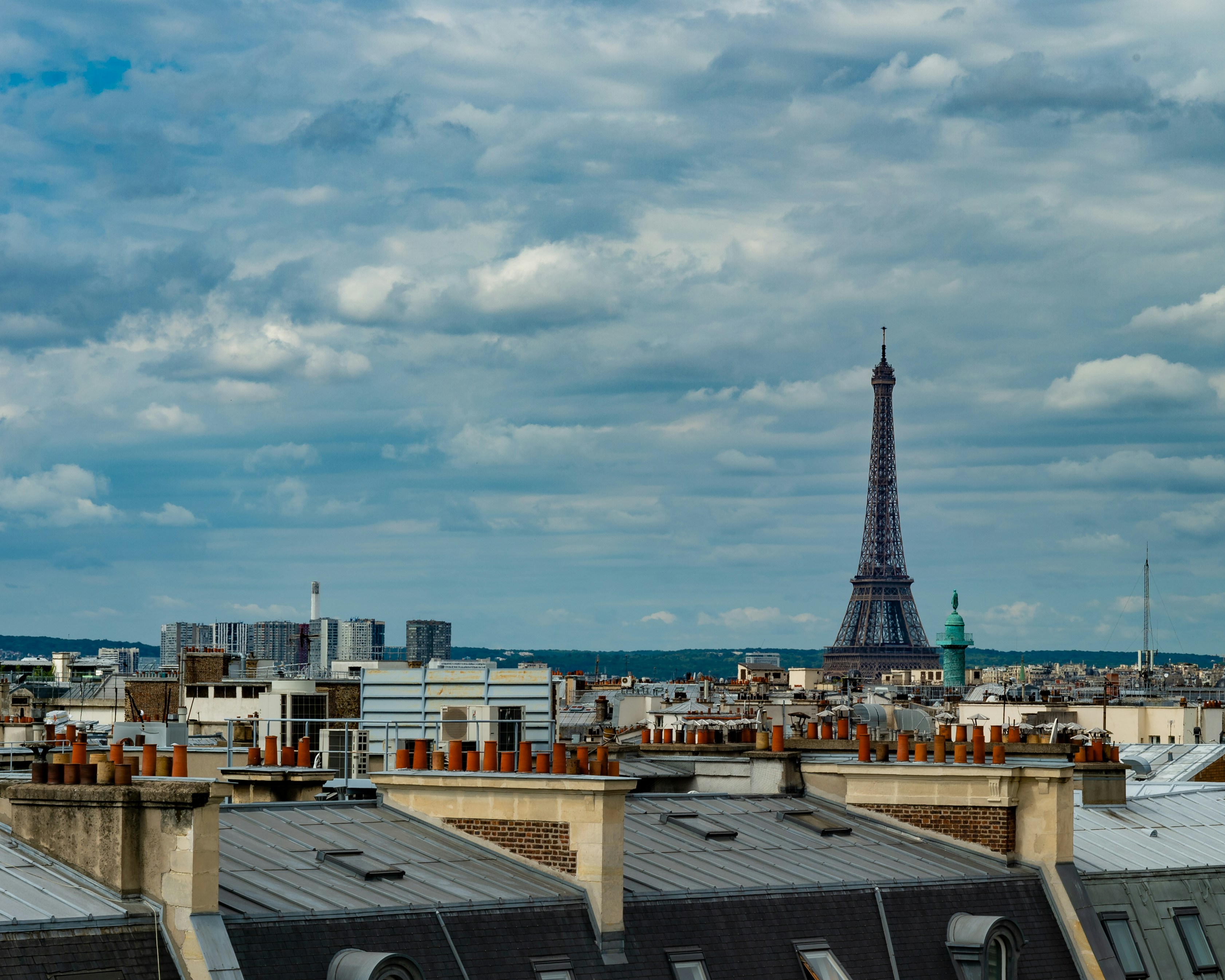 eiffel tower under blue sky and white clouds during daytime, Picture postcard view of the Paris skyline with the Eiffel Tower.