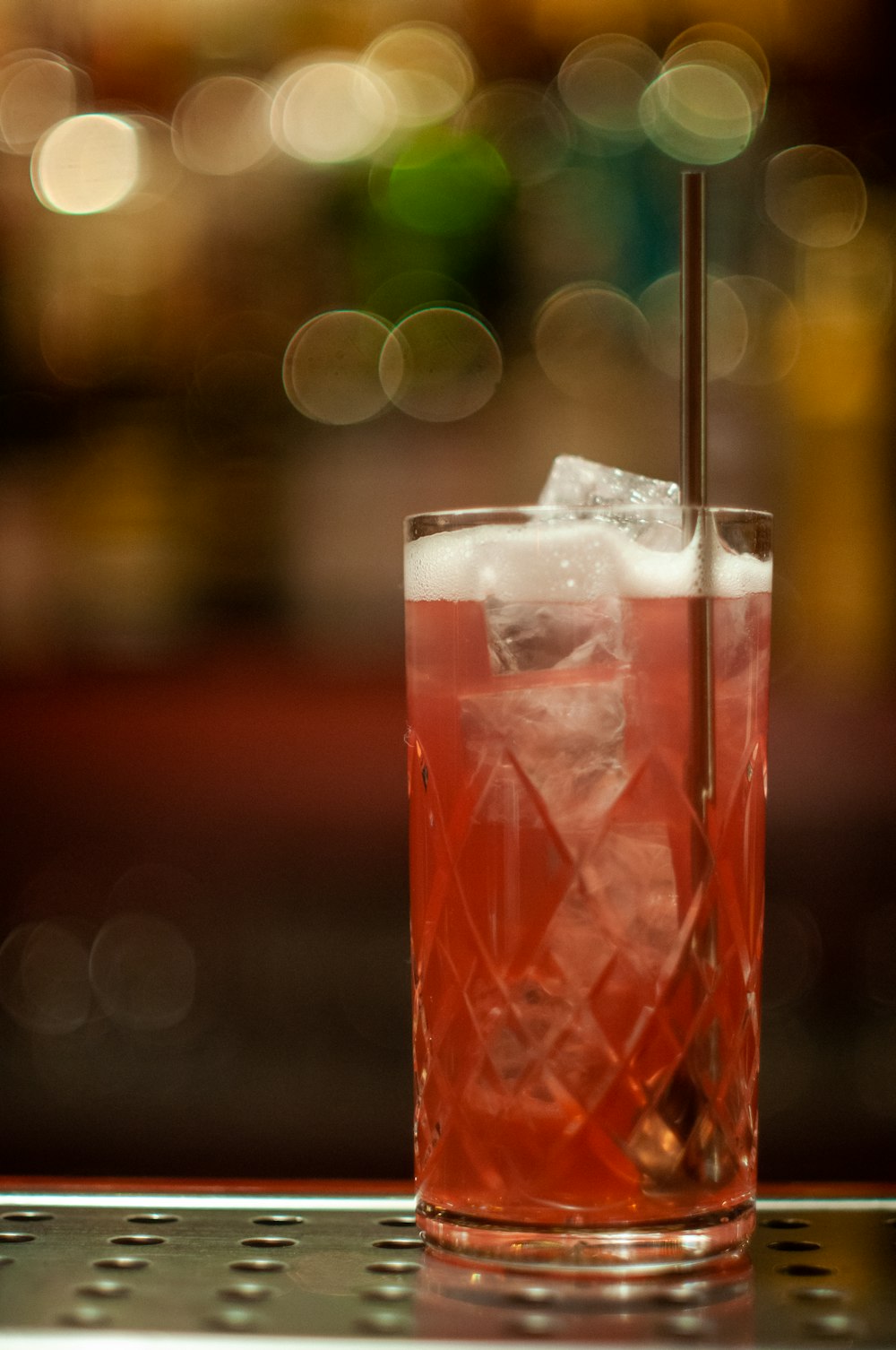 clear drinking glass with red liquid