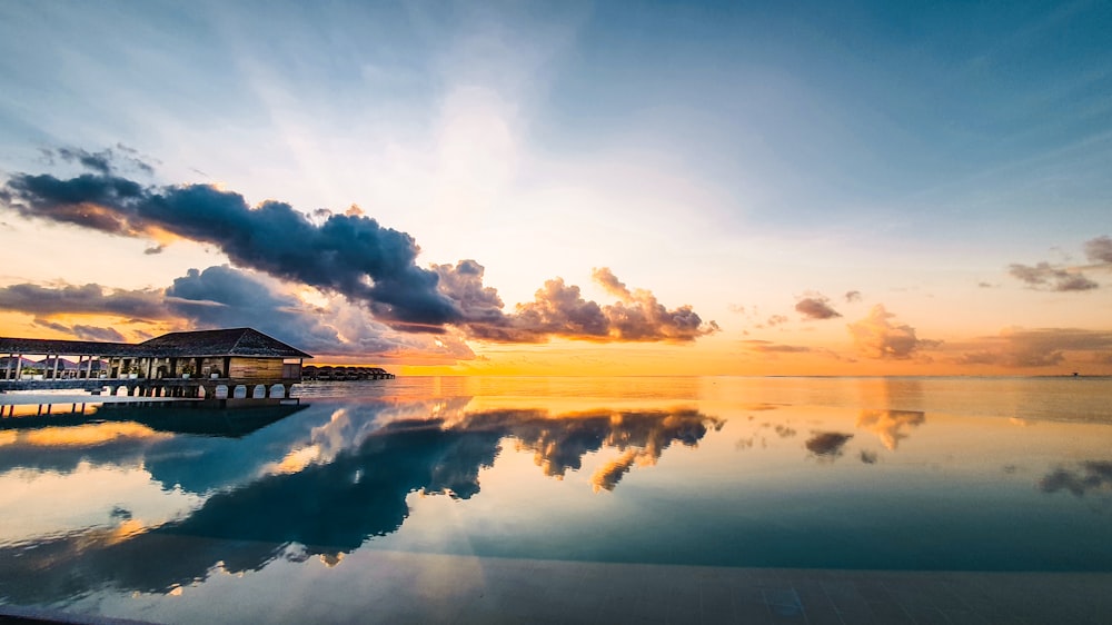 body of water under blue sky during daytime