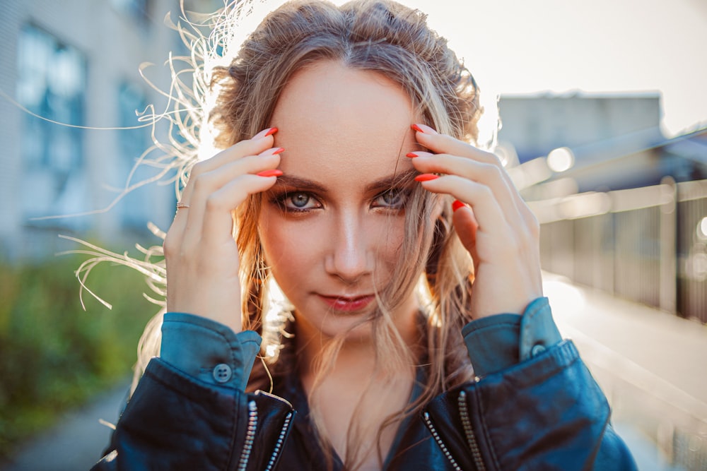 woman in black leather jacket