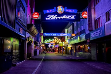 people walking on street during nighttime