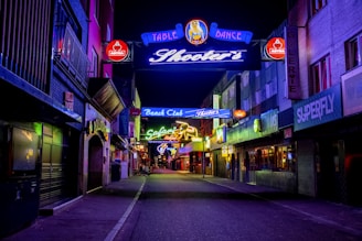 people walking on street during nighttime