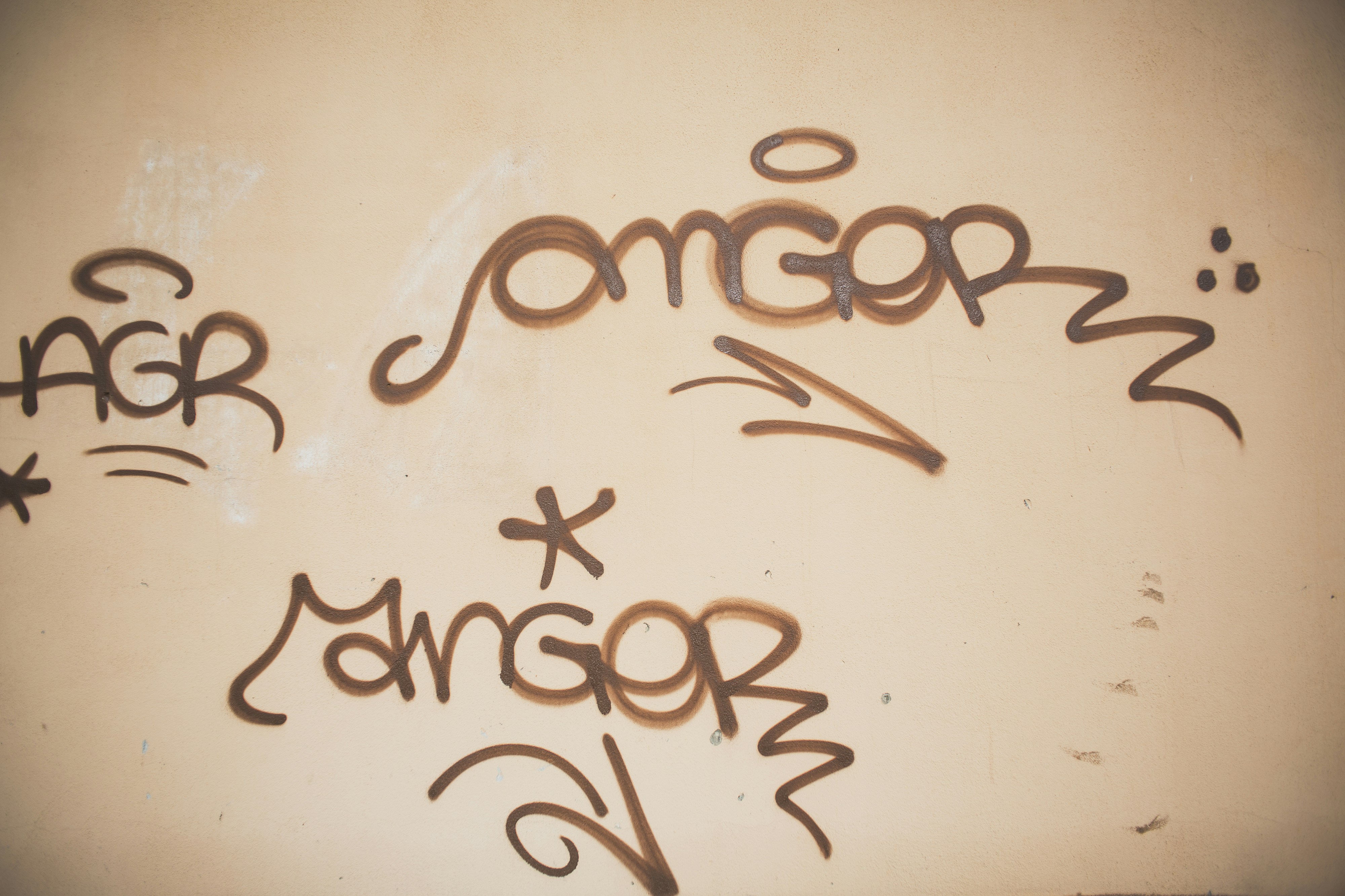 Urban street art - tag graffiti. Made with analog vintage lens, Carl Zeiss Jena Flektogon red MC 2.8 20mm (Year: 1976)