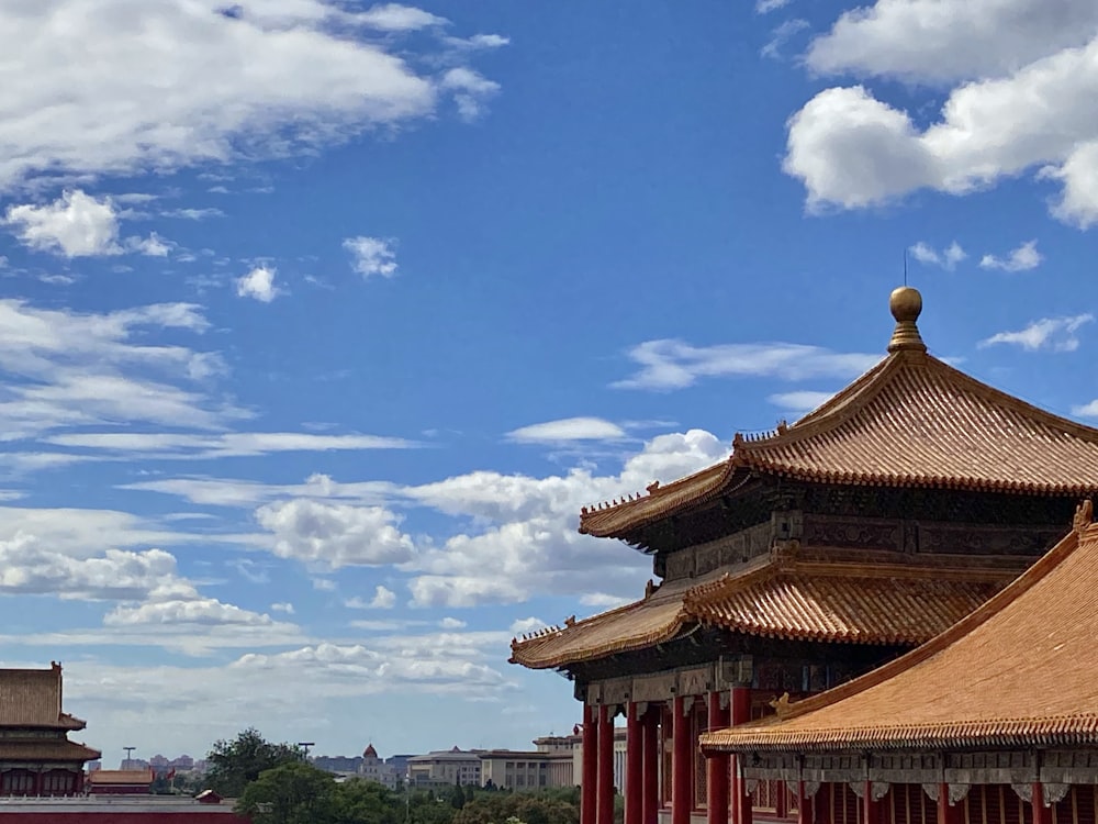 brown and white temple under blue sky during daytime