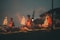 people sitting on brown wooden bench during night time