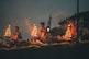 people sitting on brown wooden bench during night time