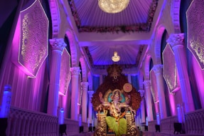 gold and purple buddha statue