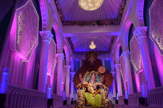 gold and purple buddha statue in Surat India