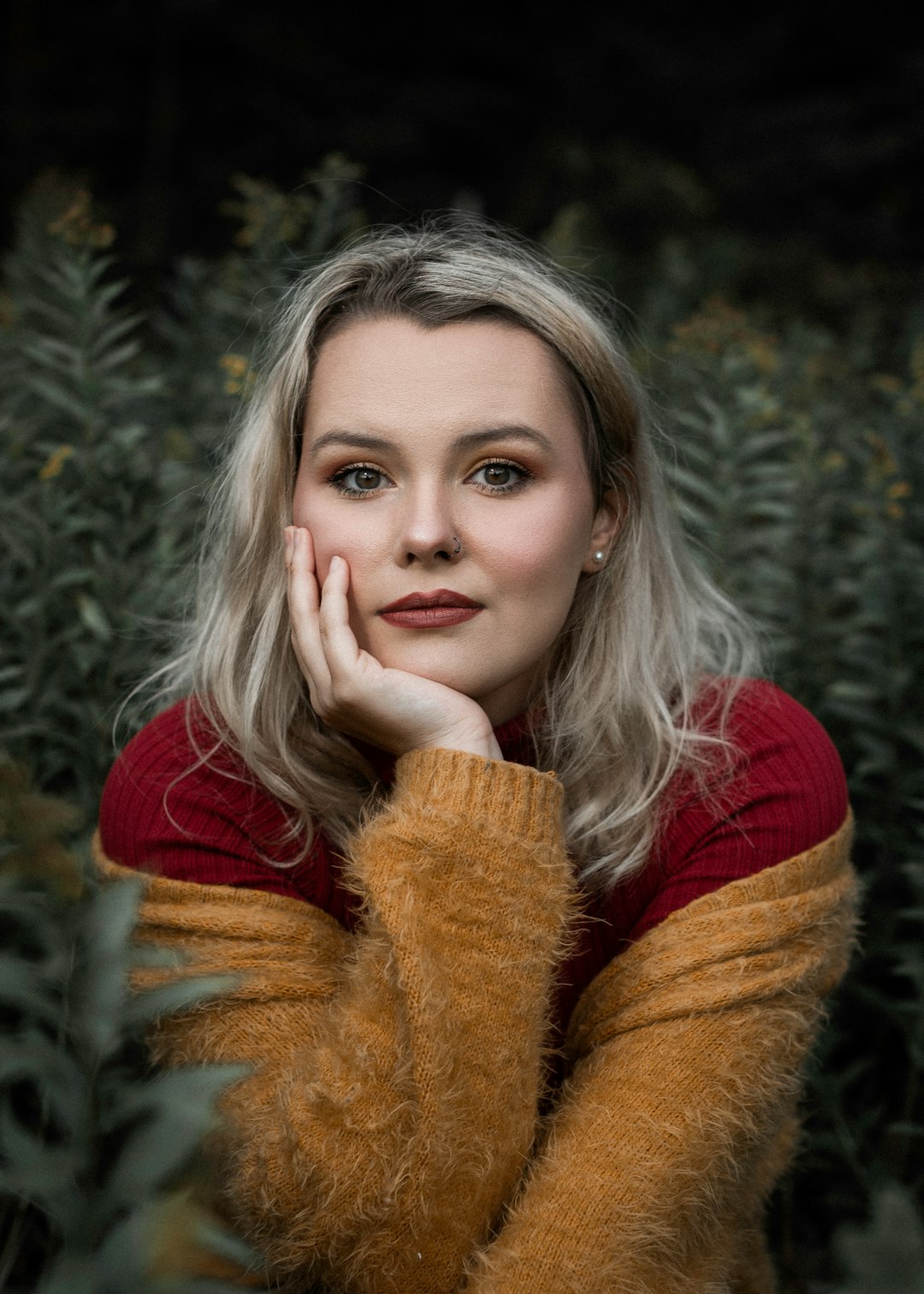 woman in red sweater smiling