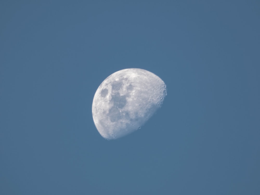 full moon in blue sky