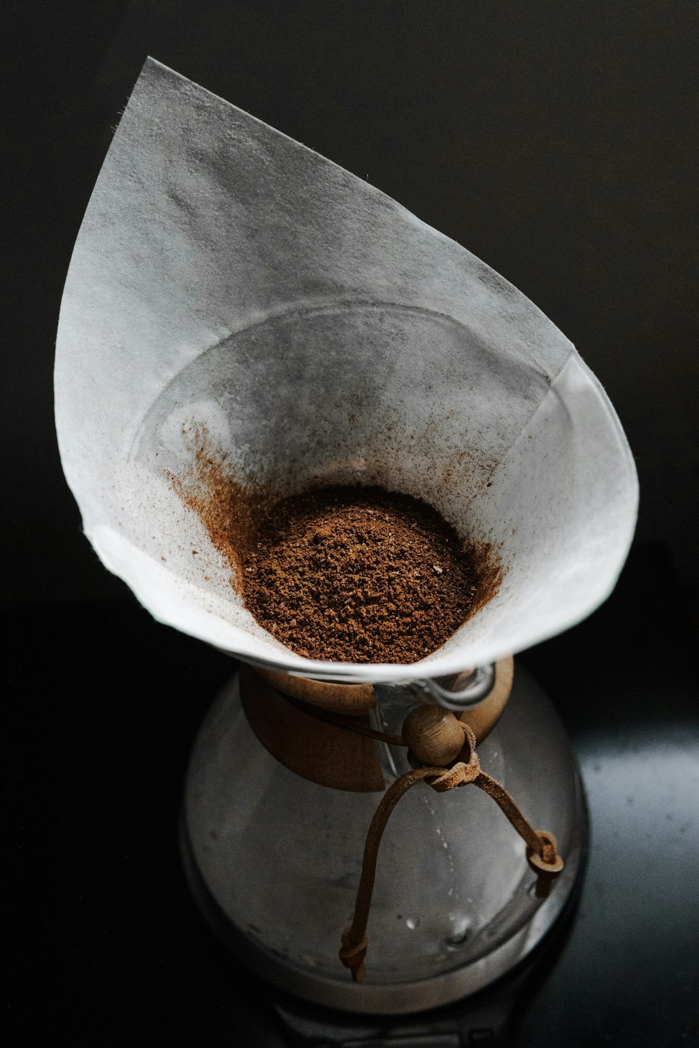 stainless steel kettle with brown liquid