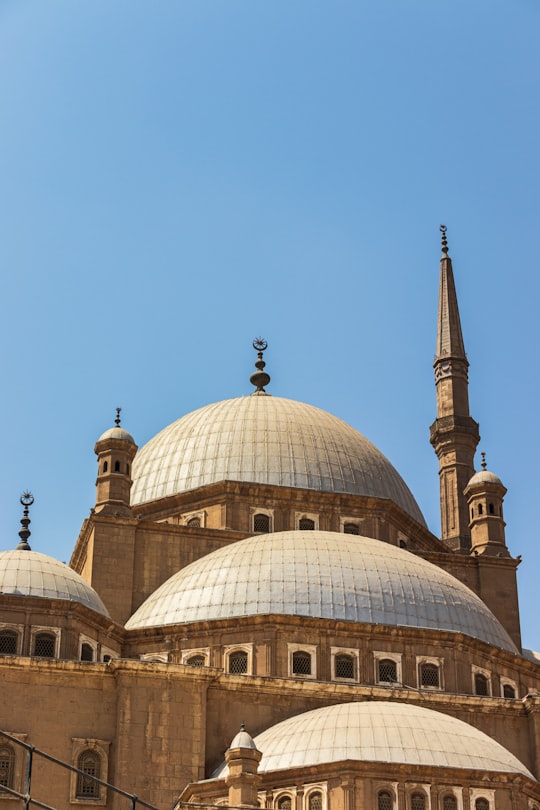 white and brown dome building in Mosque of Muhammad Ali Egypt