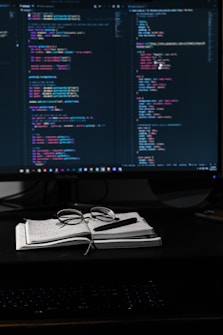 software engineer working on code representing innovation for national interest waiver visa