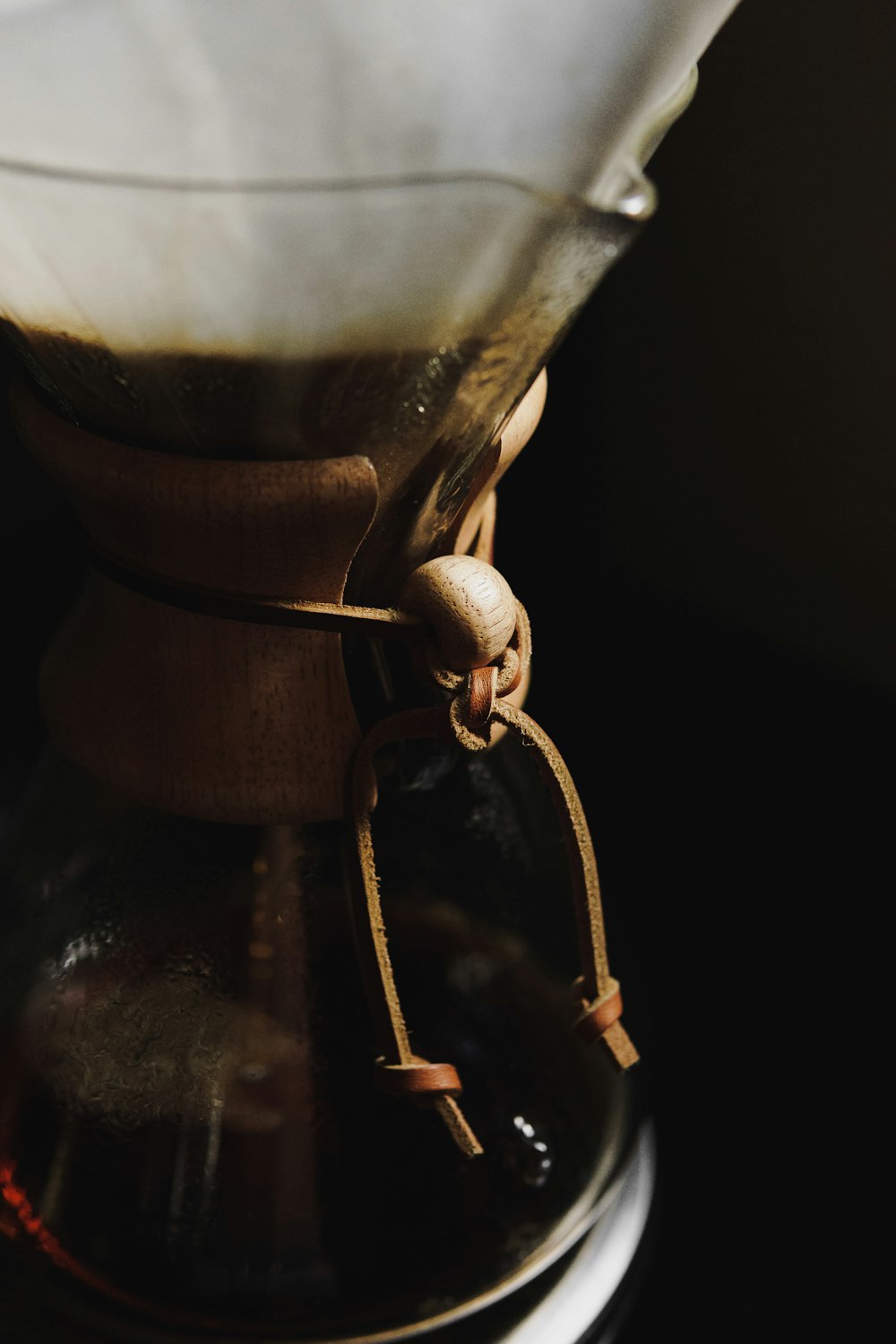 brown wooden stand with white ceramic cup