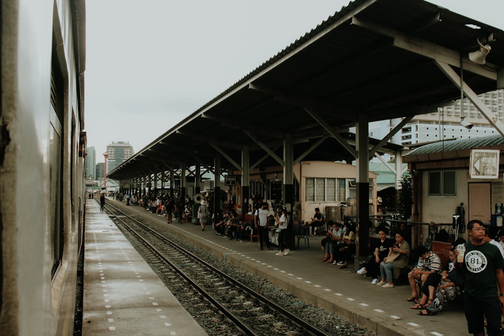 people walking on train station during daytime