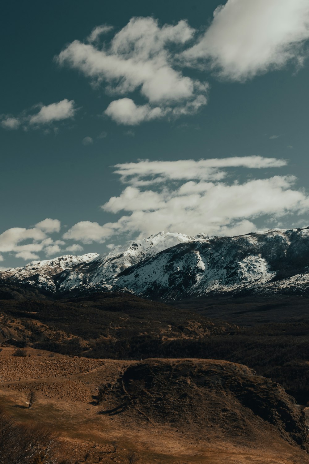 snow covered mountain under blue sky during daytime