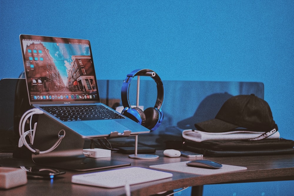 black laptop computer on white table