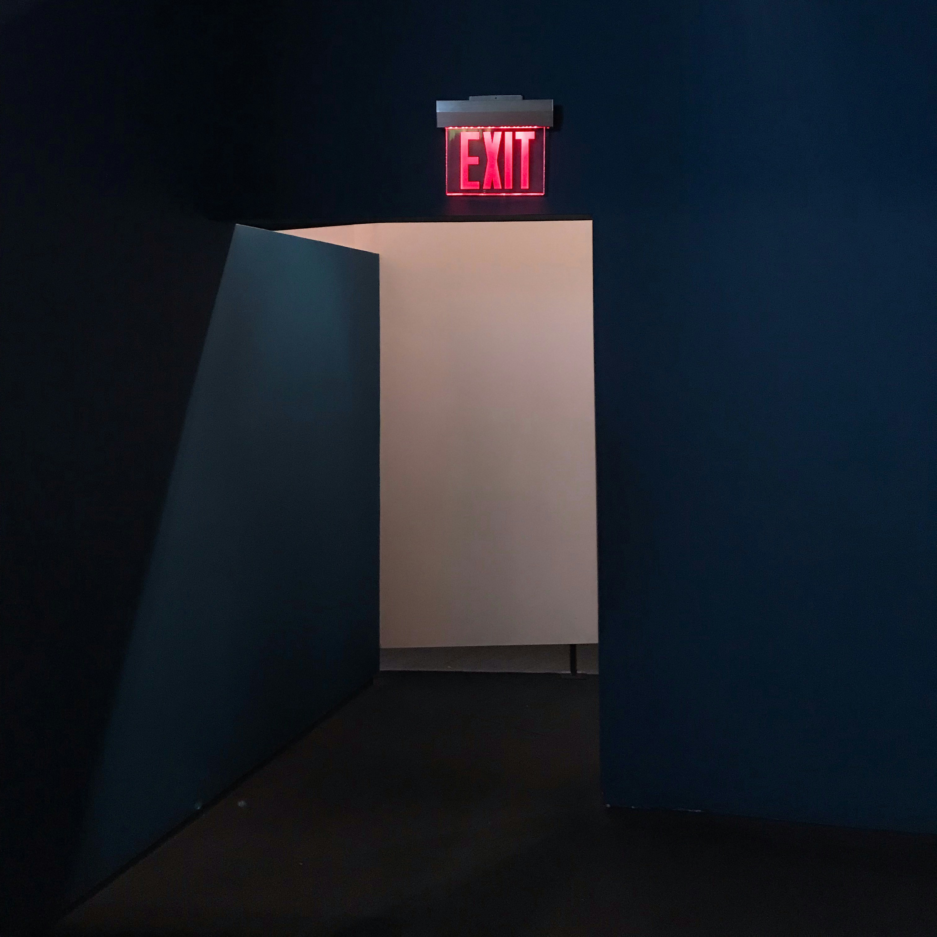 Exit Signs and Epiphany: Architecture of Departure