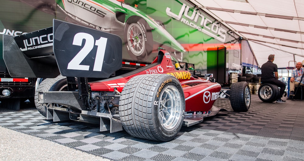 red and black f 1 car