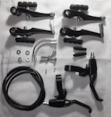 A variety of brake parts arranged on a table.