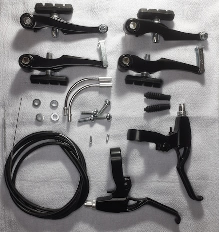 An assortment of brake linings compatible with various vehicle models.