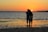 Couple admiring the sunset at Kanyakumari beach.