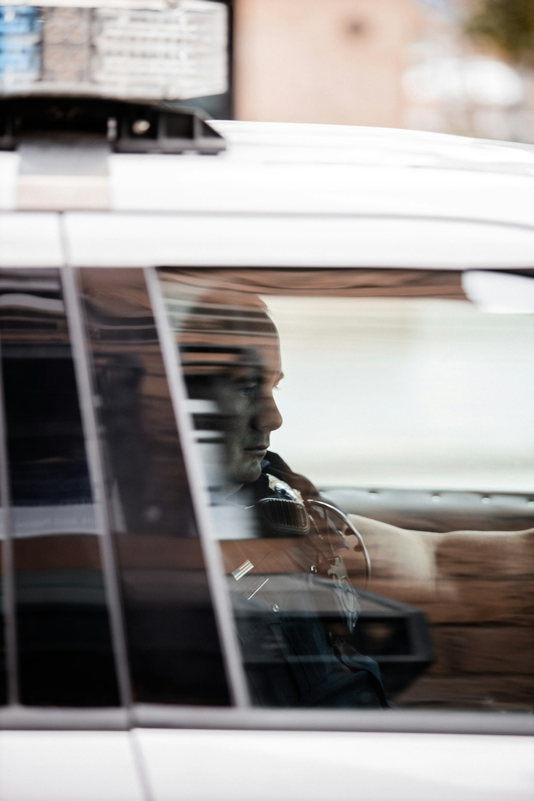 woman in black jacket sitting on vehicle seat